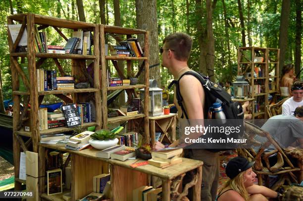 Festivalgoers relax in The Nook during the 2018 Firefly Music Festival on June 17, 2018 in Dover, Delaware.