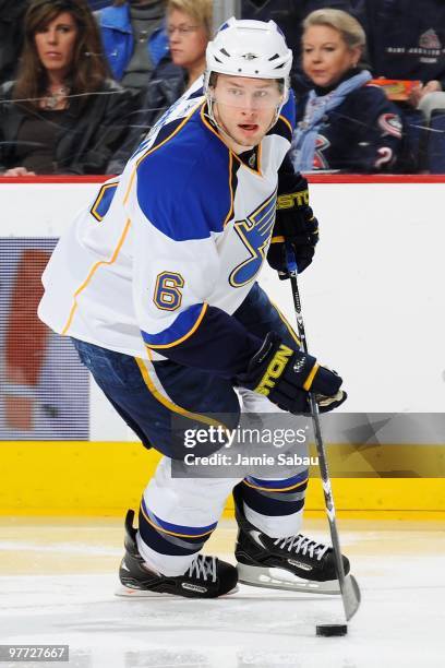 Defenseman Erik Johnson of the St. Louis Blues skates with the puck against the Columbus Blue Jackets on March 13, 2010 at Nationwide Arena in...