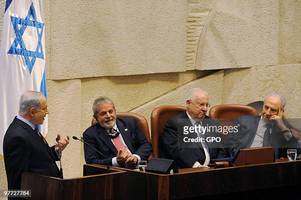 In this handout image supplied by the Israeli Government Press Office , Israel's Prime Minister Benjamin Netanyahu addresses the Knesset as Brazilian...