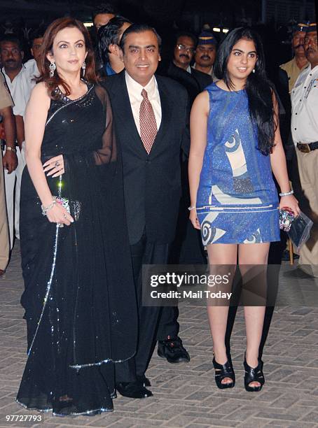 Mukesh and Neeta Ambani with daughter Isha at the IPL opening party in Mumbai on March 11, 2010.