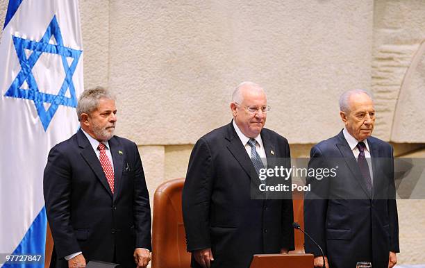 Brazilian President Luiz Inacio Lula da Silva , Knesset speaker Reuven Rivlin and Israeli President Shimon Peres stand at a special session of the...