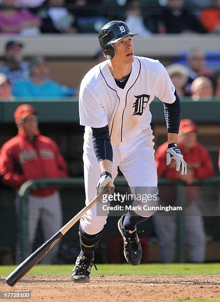Don Kelly of the Detroit Tigers watches his seventh inning two-run homer while batting against the Houston Astros during a spring training game at...