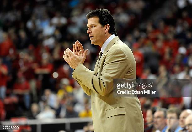 Head coach Steve Alford of the New Mexico Lobos watches his players during their 75-69 quarterfinal game victory over the Air Force Falcons at the...