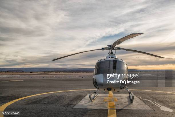 helicopter on landing pad at dusk, las vegas, nevada, usa - helipad stock pictures, royalty-free photos & images