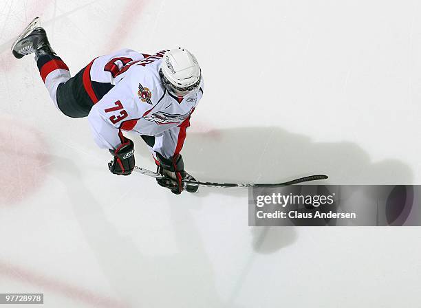 Michael Whaley of the Windsor Spitfires fires a shot in warm-up prior to a game against the London Knights on March 12, 2010 at the John Labatt...