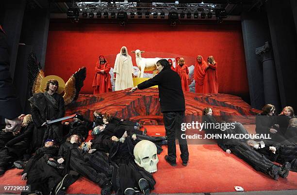 German theatre director Christian Stueckl , an Oberammergau native, directs actors during rehearsals at Oberammergau's Passion Play theatre March 9,...