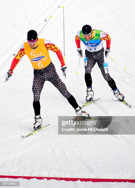 Gold medal winner Brian McKeever of Canada wins the men's visually impaired 20km free cross-country skiing race during Day 4 of the 2010 Vancouver...