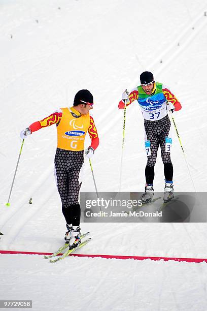 Gold medal winner Brian McKeever of Canada wins the men's visually impaired 20km free cross-country skiing race during Day 4 of the 2010 Vancouver...