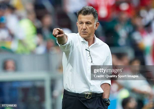 Juan Carlos Osorio, Manager of Mexico gives instructions during the 2018 FIFA World Cup Russia group F match between Germany and Mexico at Luzhniki...