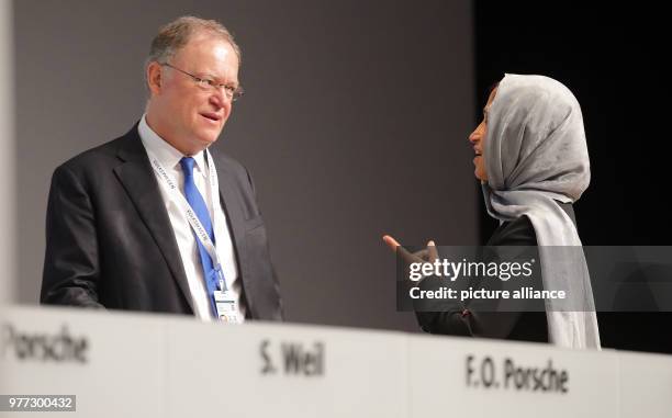 May 2018, Germany, Berlin: Stefan Weil , premier of North Rhine-Westphalia, in conversation with Hessa Sultan Al Jaber, Minister of Information and...