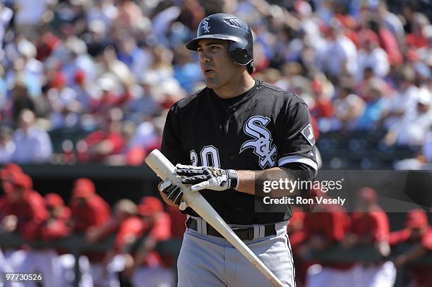 Carlos Quentin of the Chicago White Sox looks on against the Los Angeles Angels of Anaheim during a spring training game on March 12, 2010 at Tempe...