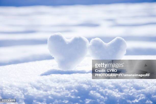 two lovehearts made from snow - creative rf stock pictures, royalty-free photos & images