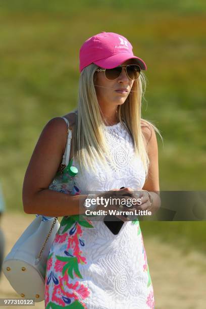 Wife of Patrick Reed of the United States, Justine Karain, looks on during the final round of the 2018 U.S. Open at Shinnecock Hills Golf Club on...