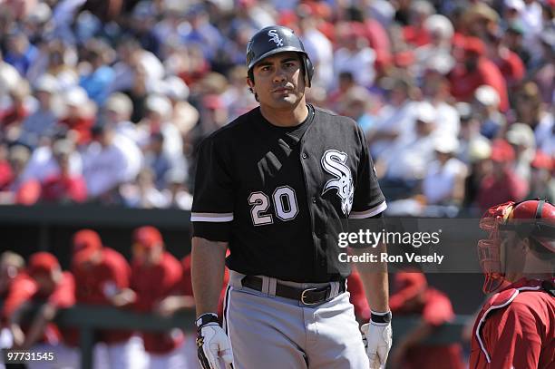 Carlos Quentin of the Chicago White Sox looks on against the Los Angeles Angels of Anaheim during a spring training game on March 12, 2010 at Tempe...