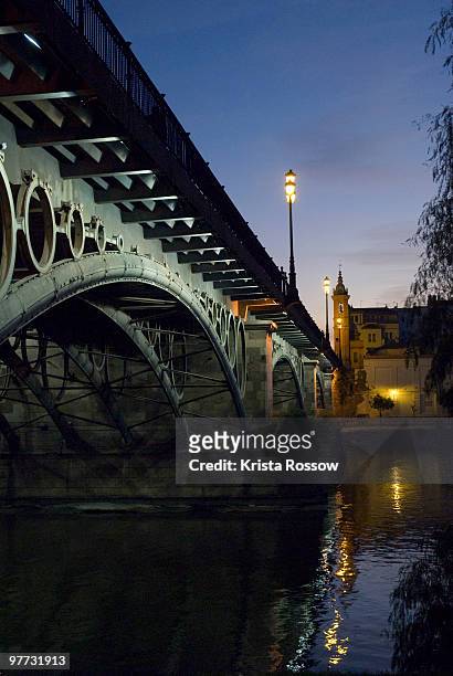 seville, andalusia, spain, puente de triana - krista rossow stock pictures, royalty-free photos & images