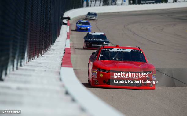 McLeod, driver of the Chevrolet, leads a pack of cars during the NASCAR Xfinity Series Iowa 250 presented by Enogen at Iowa Speedway on June 17, 2018...