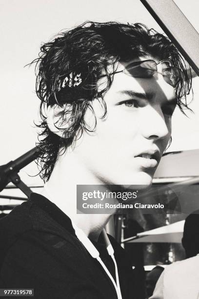 Model is seen backstage ahead of the Palm Angels show during Milan Men's Fashion Week Spring/Summer 2019 on June 17, 2018 in Milan, Italy.