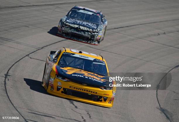 Daniel Hemric, driver of the South Point Hotel & Casino Chevrolet, leads a pack of cars during the NASCAR Xfinity Series Iowa 250 presented by Enogen...