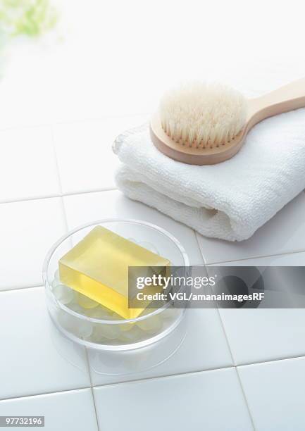 soap and brush on towel - back brush stock pictures, royalty-free photos & images