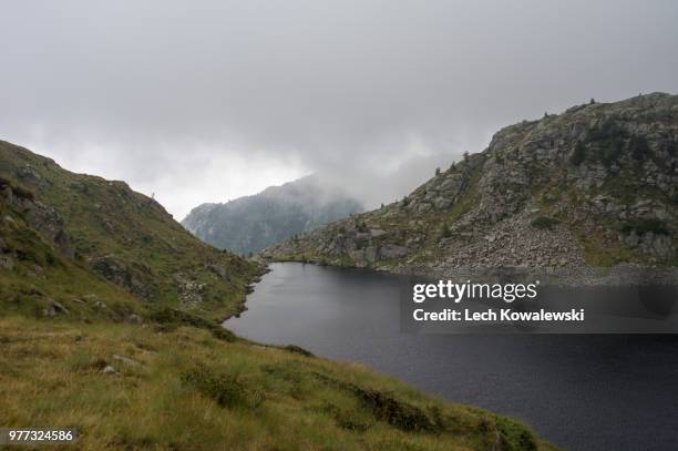 dark lake in dolomites brenta - lech valley bildbanksfoton och bilder