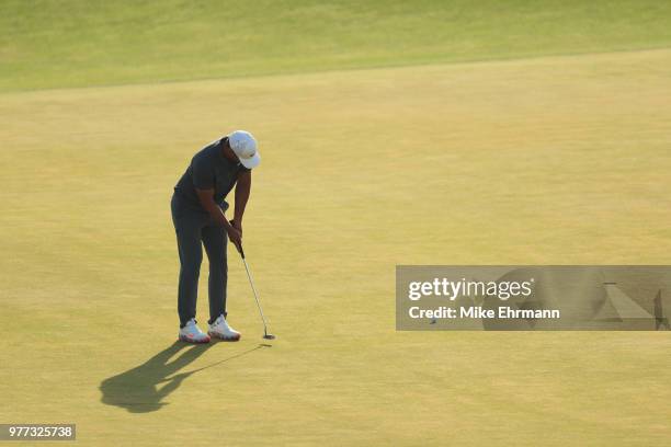 Brooks Koepka of the United States putts on the 18th green during the final round of the 2018 U.S. Open at Shinnecock Hills Golf Club on June 17,...