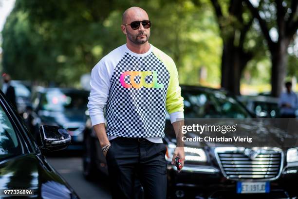 Milan Vukmirovic wearing jumper with print cool is seen outside MSGM during Milan Men's Fashion Week Spring/Summer 2019 on June 17, 2018 in Milan,...