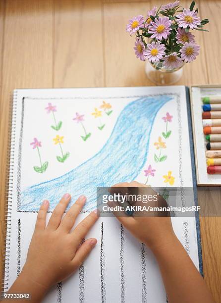 child drawing on paper - creative rf stock-fotos und bilder