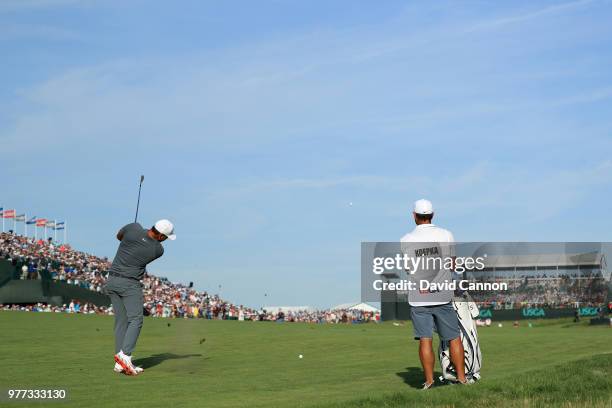 Brooks Koepka of the United States plays his second shot on the 18th hole during the final round of the 2018 US Open at Shinnecock Hills Golf Club on...