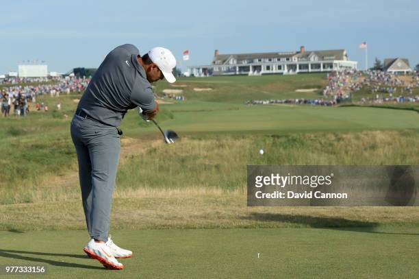 Brooks Koepka of the United States plays his tee shot on the 18th hole during the final round of the 2018 US Open at Shinnecock Hills Golf Club on...