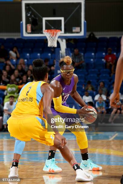 Essence Carson of the Los Angeles Sparks handles the ball against the Chicago Sky on June 17, 2018 at the Allstate Arena in Rosemont, Illinois. NOTE...