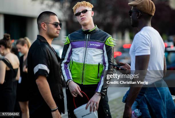 Shaun Ross wearing leather jacket and bag Palm Angels seen outside Palm Angels during Milan Men's Fashion Week Spring/Summer 2019 on June 17, 2018 in...