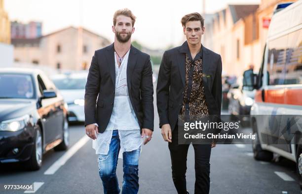 Andre Hamann and Corentin Huard seen outside Dsquared2 during Milan Men's Fashion Week Spring/Summer 2019 on June 17, 2018 in Milan, Italy.