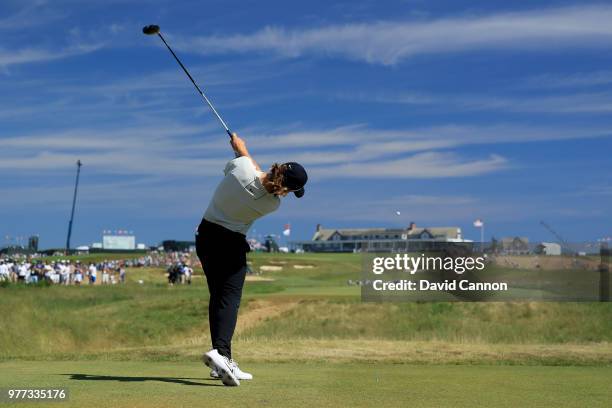 Tommy Fleetwood of England plays his tee shot on the 18th hole on his way to scoring a seven under par 63 and ultimate second place by one shot to...