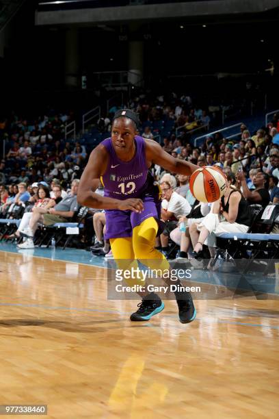 Chelsea Gray of the Los Angeles Sparks handles the ball against the Chicago Sky on June 17, 2018 at the Allstate Arena in Rosemont, Illinois. NOTE TO...