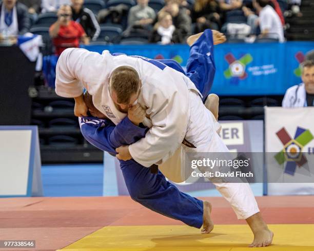 Thomas Freese of Germany throws Christophe Fouache for an ippon to finish Germany's five contests with five ippons against France in their M4...