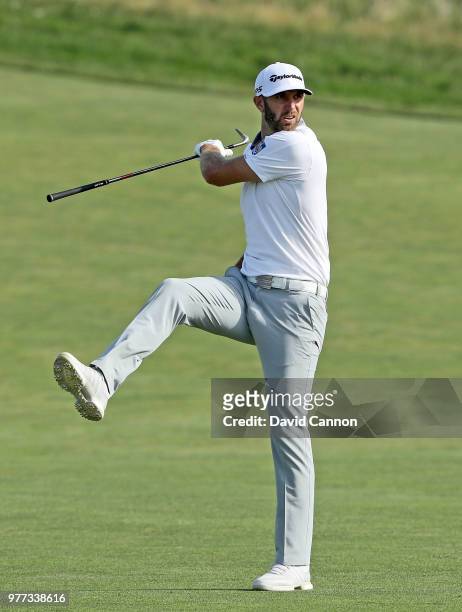 Dustin Johnson of the United States reacts to his second shot on the 15th hole during the final round of the 2018 US Open at Shinnecock Hills Golf...