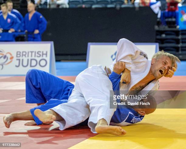 Mario Schult of Germany screams with joy after throwing Frederic Bouttier of France for ippon helping Germany defeat France 5/0 in their M4 team...