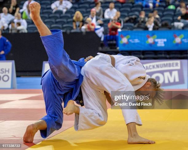 Mario Schult of Germany throws Frederic Bouttier of France for ippon helping Germany defeat France 5/0 in their M4 team contest during day 4, the...