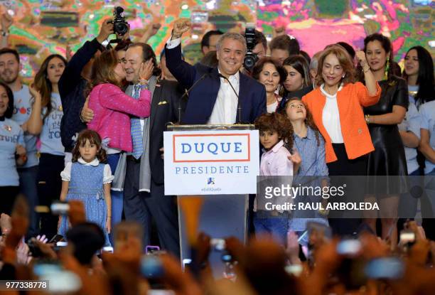 Newly elected Colombian president Ivan Duque celebrates with supporters in Bogota, after winning the Colombian presidential election on June 17,...