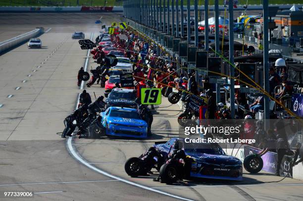 Brandon Jones, driver of the XYO Networks Toyota, makes a pit stop during the NASCAR Xfinity Series Iowa 250 presented by Enogen at Iowa Speedway on...