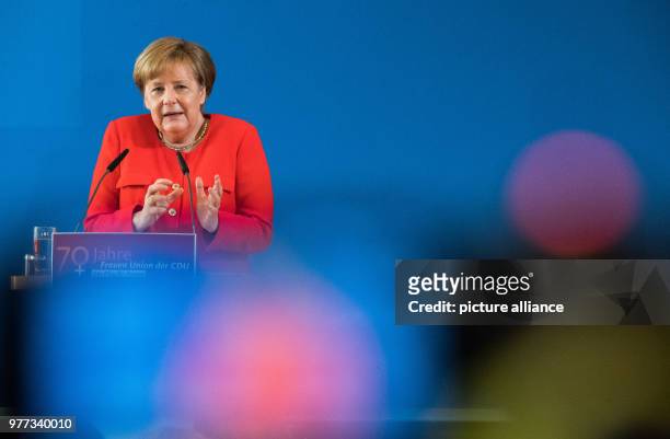 German Chancellor Angela Merkel delivers speech during a ceremony celebrating the 70th anniversary of the Union, at Hotel Spenerhaus in...