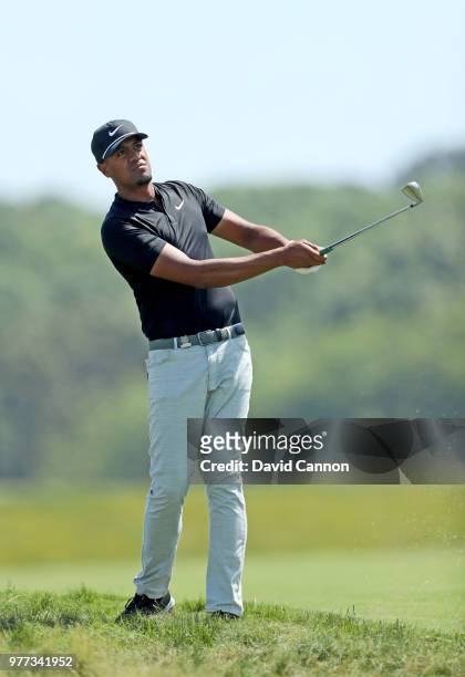 Tony Finau of the United States plays his second shot on the third hole during the final round of the 2018 US Open at Shinnecock Hills Golf Club on...