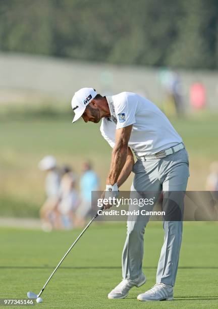 Dustin Johnson of the United States plays his second shot on the 16th hole during the final round of the 2018 US Open at Shinnecock Hills Golf Club...