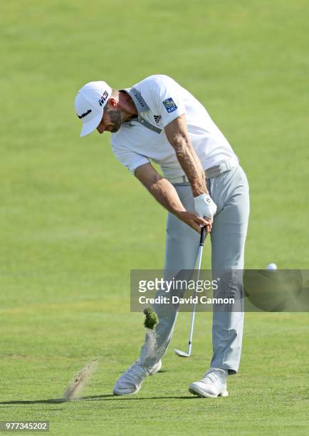 Dustin Johnson of the United States plays his second shot on the 12th hole during the final round of the 2018 US Open at Shinnecock Hills Golf Club...