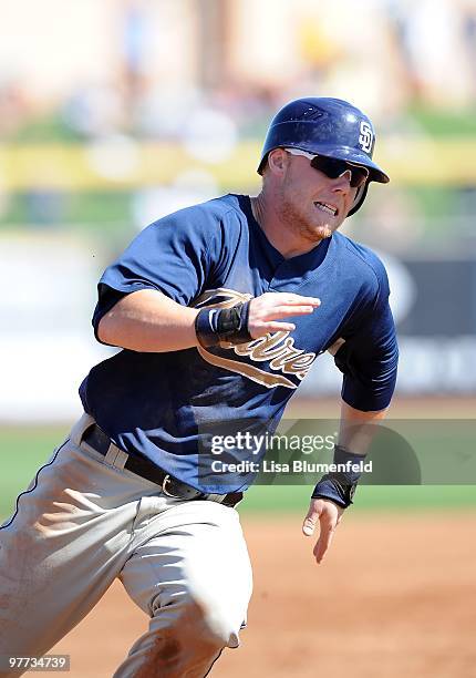 Aaron Cunningham of the San Diego Padres runs the bases during a Spring Training game against the Seattle Mariners on March 5, 2010 at Peoria Stadium...