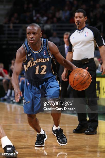 Earl Boykins of the Washington Wizards moves the ball against the Milwaukee Bucks during the game on March 3, 2010 at the Bradley Center in...