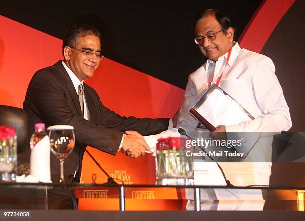 India Today group chairman Aroon Purie with Union Home Minister P Chidambaram at the India Today Conclave in New Delhi on March 12, 2010.