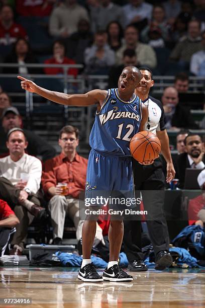 Earl Boykins of the Washington Wizards looks to move the ball against the Milwaukee Bucks during the game on March 3, 2010 at the Bradley Center in...