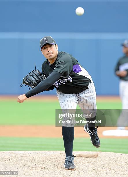 Jorge De La Rosa of the Colorado Rockies pitches during a Spring Training game against the San Diego Padres on March 8, 2010 at Peoria Stadium in...