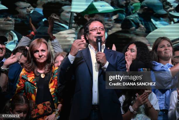 Surrounded by his family and supporters, presidential candidate Gustavo Petro speaks after his defeat by conservative rival Ivan Duque in Colombia's...